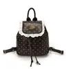 Mochila de bolinhas estilo coreano para meninos e meninas, mochila de viagem para bebês com acabamento delicado de renda, nova mochila infantil da moda