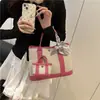 Bolsa de Jardín de Lona de Gama Alta 2025 Nueva Bolso de Mujer de Color Contrastante Bolso de Hombro Casual para Viajar Bolso Tote Estilo Occidental