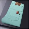 Jeans Finos Tendência de Marca Verde Claro para Homens, Calças Coloridas, Jeans Casuais Slim Retos Elásticos para o Verão de 2026