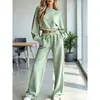 Conjunto de sudadera casual de moda de alta gama de color liso, manga corta y larga, y pantalones anchos elásticos, nuevo para otoño e invierno 2026 en Europa y América