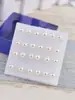 Una Caja de Pendientes de Plástico con Strass para Perforación de Oreja, Adecuados para Hombres y Mujeres, Estilo Coreano, Pendientes Pequeños Elegantes, Joyería para Toda la Oreja, Barras para Oreja 2026