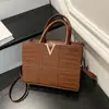 Bolsa casual simples de nicho estilo coreano para mulheres, nova moda primavera 2026 bolsa tiracolo, bolsa de ombro estilo ins