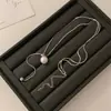 Collar largo de perlas dibujables 2023 nueva cadena simple elegante para suéter