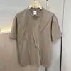 Camiseta de manga corta de diseño deconstruido de corte tridimensional minimalista de alta gama para hombre, camiseta de verano de manga media estilo americano de corte holgado, moderna
