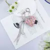 Chaveiro com Pingente de Bolsa Coração de Tecido Estilo Coreano Ins Nicho Personalidade Miu Cordão Trançado Acessório de Casal para Meninas