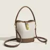 Bolsas de Verano Transfronterizas para Mujer 2026 Nuevo Estilo Coreano de Moda Bolsos Texturizados Bolsos Cubo Bolsos de Lona Bolsos Cruzados Fabricante