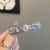 Presilha de Cabelo Exquisita com Laço de Pérola e Diamantes Cintilantes, Presilha Bico de Pato, Presilha para Franja Lateral, Novo Acessório de Cabelo Versátil da Moda 2026