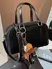 Bolsa de Bowling Portátil Casual 2025 Nueva Moda Gamuza Escarchada Retro de Aspecto Elegante Bolso Cruzado Sencillo