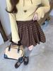 Foto Real de Conjunto de Suéter de Punto Amarillo de Manga Larga con Corbata de Moño Francesa + Falda de Hinchazón de Color Marrón a Cuadros