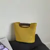 Bolso de Mano Pequeño de Gama Alta para Mujer Nuevo Bolso Cubo Retro Gran Capacidad Moderno Bolso de Hombro Cruzado para Viajes de Negocios Transfronterizo