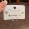 Ear Cuff de Círculo Radiante de Zirconia Exquisito de Lujo Ligero Francés Juego de Tres Piezas Pendientes de Diseño Pequeño Versátil para el Viaje Diario