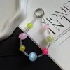 Nuevas Cuentas Ojo de Gato Falsas Cuentas de Semilla Lanyard para Teléfono Móvil Llavero Creativo Colorido Colgante para Bolso Venta al por Mayor