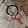 Lazo para el pelo de lunares rosa dulce con textura francesa, banda elástica versátil de alta elasticidad, elegante accesorio para el cabello para mujeres