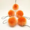 Colgante de cordón para teléfono móvil de bola de pelo artificial de Guangdong con orejas, procesamiento de bola de pelo, bola de pelo de conejo artificial, colgante de pelo para bolso