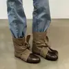 Versión de piel de vaca estilo vaquero de pastoreo de nicho con cordones botas vaqueras occidentales botas cortas para mujer nuevo estilo 2026 moda otoño e invierno botas para mujer