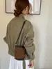 Bolso de axila para mujer para desplazamientos transfronterizos, nuevo estilo 2026, bolso tote de gamuza de alta gama, bolso de hombro y bolso cruzado elegante