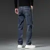 Moda popular para hombre / Nueva colección Primavera/Otoño 2026: pantalones de mezclilla elásticos para hombre, tiro medio a alto, ligeros, estilo casual de negocios, corte ajustado, versátiles