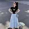 Conjunto Ligero de Verano para Niñas: Conjunto de Dos Piezas: Camiseta de Manga Corta con Lazo Dulce y Lindo y Falda Elegante Femenina