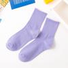 Venta directa de fábrica de calcetines de primavera con explosiones de colores sólidos japoneses de color caramelo para mujer, calcetines de colores de marea, venta al por mayor
