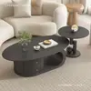 Mesa de centro de pizarra con forma ovalada para sala de estar, moderna, de alta gama, simple, adecuada para espacios pequeños, estilo crema, popular en línea