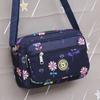 Bolsa de pano de flores Nova bolsa crossbody feminina Pano Oxford Bolsa de mãe de meia-idade e idosa Bolsa Bolsa de ombro multicamadas Bolsa de lona