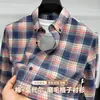 Camisa de Manga Larga a Cuadros Casual de Algodón Modal para Hombre 2026 Nueva Camisa de Otoño con Cuello de Botones para Hombres de Mediana Edad
