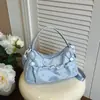 2026 Otoño Nueva Estrella Bolso de un Hombro para Mujer Estudiante Estilo Coreano Alta Apariencia Capacidad Bolso de Mano Bolso Estilo Perezoso