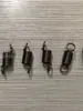 Accesorios para Máquinas de Pegado: Soporte para cuchillos, Controlador de cabezal de máquina, Interruptor sensor, Soporte para cinta, Soporte para película, Resorte, Condensador, Cuchilla de corte, Rodamiento