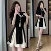Conjunto de Top e Saia Curta Qipao Chinês Plus Size 2024 Versão Melhorada de Verão Botão de Sapo Novo Estilo Parece um Conjunto de Duas Peças
