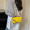 Bolso pequeño cuadrado de nuevo estilo coreano y japonés para mujer, bolso de mano popular cruzado al hombro, versátil y moderno para jóvenes 2026