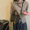 Bolso Cubo Tejido de Textura Niche Coreano para Mujer 2026 Verano Nueva Moda Gran Capacidad para Viajar al Trabajo Hombro Único Cruzado Bolso Pequeño