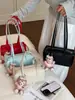 Bolso tipo almohada casual nuevo de verano 2026, Bolso de hombro único de alto estilo para el trabajo, Bolso de axila de nicho a la moda para mujer