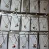 Nuevo collar transfronterizo de 2 piezas, cadena de clavícula de doble pieza de aleación, colgante múltiple, collar de estudiante mixta para niña, 2 yuanes