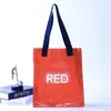 Suministro directo de fábrica Bolsa de mano de PVC para láser colorida para influencers de plástico transparente tipo gelatina Bolsa de mano de TPU se puede imprimir logo