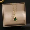 Cadena de clavícula de acero de titanio estilo retro nacional moda candado de paz de jade colgante de izaje todo partido temperamento accesorios de estilo chino de alta calidad