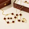 Set de Cuatro Piezas de Trébol de Cuatro Hojas de Doble Cara Más Vendido Transfronterizo: Collar, Aretes, Pulsera, Anillo, Conjunto de Joyería Versátil y Elegante de Cinco Hojas