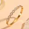 Versátil Transfronterizo Acero Inoxidable Electrochapado al Vacío Joyería Flor Pequeña Patrón de Ojo Varios Brazaletes para Mujer Brazaletes de Diamante