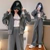 Traje a rayas con capucha para niña primavera 2023 nueva moda suéter deportivo para niña pantalones de pierna ancha traje de dos piezas moda