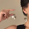 Pendientes de gancho grandes con forma de pétalo hueco plateados para mujer, estilo francés, accesorio de moda de verano nuevo 2026, pendientes elegantes y modernos