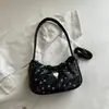 Bolsa linda de gran capacidad estilo coreano, nuevo bolso de hombro de moda otoño 2026, bolso de axila simple y elegante para el día a día