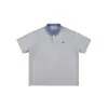 Camiseta a Cuadros de Empalme Contrastante Estilo Coreano de Manga Corta para Hombre Verano 2025 Nuevo Retro Holgada Ajustada Cuello Polo
