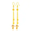 Pendientes de oro de 18 quilates de imitación de lujo ligeros con borlas, joyería de celebridades de Internet, pendientes sencillos de trébol de cuatro hojas de oro con arena viva, suministro de puesto