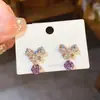 Pendientes de Aguja de Plata de Lujo Ligero con Lazo de Diamante, Flor de Cuatro Hojas, Pétalo, Personalidad Nicho Elegantes de Gama Alta para Mujeres