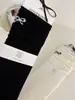 Nuevos calcetines de mujer estilo coreano hasta la mitad de la pantorrilla con bordes enrollados, bordado de lazo, calcetines de algodón de color liso, calcetines largos versátiles y dulces para otoño e invierno