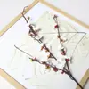 Flor de ciruelo de invierno artificial de una sola rama Decoración para sala de estar Arreglo floral Paisaje artificial Fabricante Venta al por mayor Arreglo de boda Estilo chino