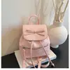 Mochila de Diseño Nicho Coreano Transfronteriza para Mujer Modelo Nuevo 2026 con Cordón de Lazo Mochila Pequeña Versátil para Estudiante