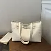 Bolsa de mão/bolsa tote de ombro feminina casual texturizada de cor sólida, nova tendência de verão 2026, grande capacidade, rebite simples