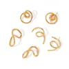Pendientes de Acero Inoxidable con Línea Retorcida Chapados en Oro de 18 Quilates Estilo Europeo y Americano para Mujer, Joyería para Orejas de Acero de Titanio Irregular Giratoria de Diseño Único