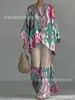Nuevo conjunto de dos piezas para mujer: camiseta casual de moda con estampado transfronterizo, cuello redondo, manga larga + pantalones de campana