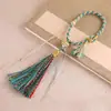 Anel de dedo tibetano botão fio de algodão esfregado à mão franja franja colorida estilo étnico chaveiro pingente acessório de bolsa franja para pendurar